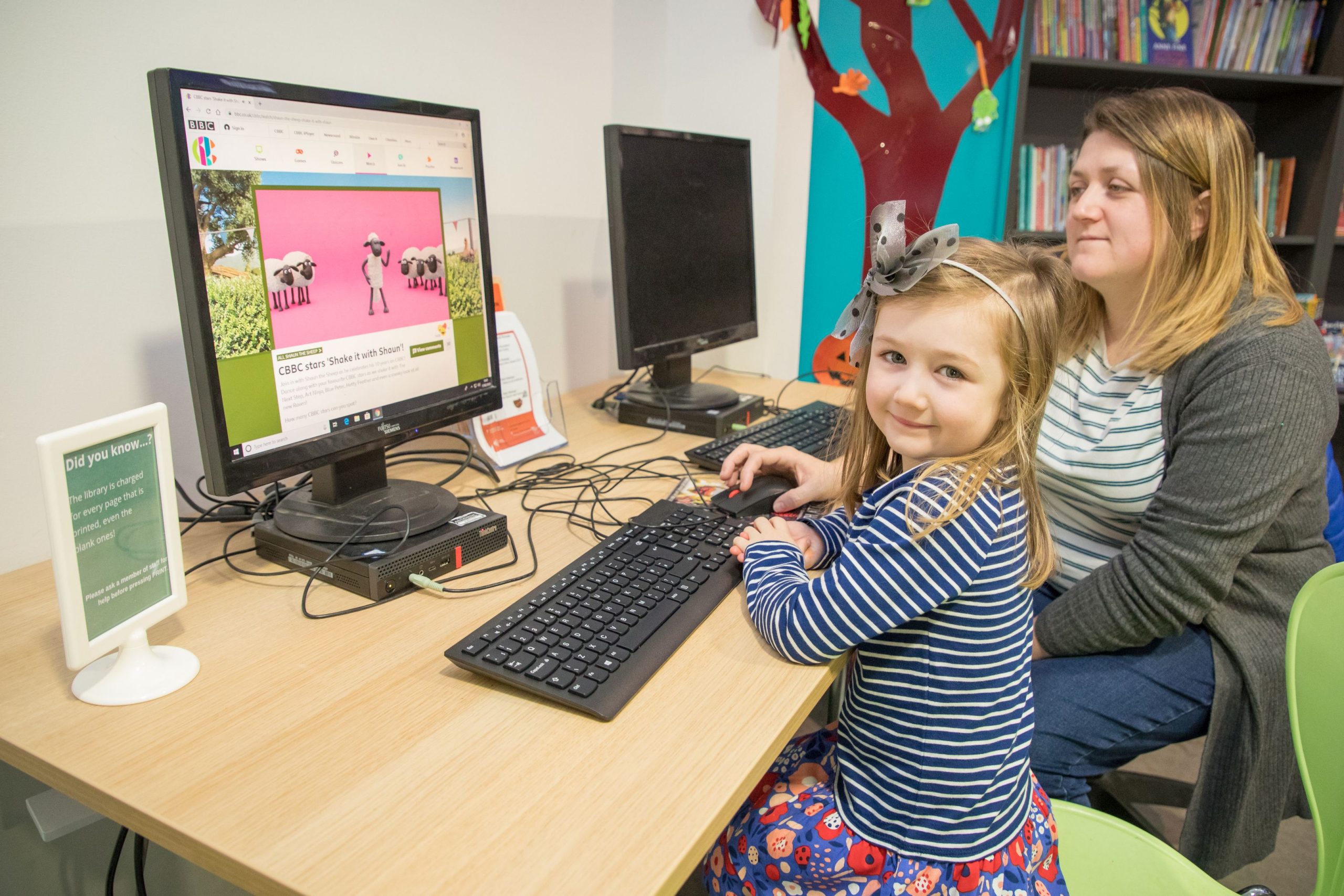 Bridgend Libraries Mother and child Using a PC at the library